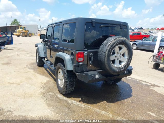 1C4BJWDG7GL337256 Jeep Wrangler Unlimited Sport