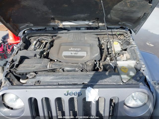 1C4BJWEG2EL157338 Jeep Wrangler Unlimited Sahara