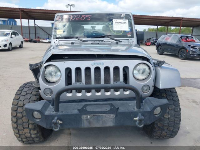 1C4BJWEG2EL157338 Jeep Wrangler Unlimited Sahara