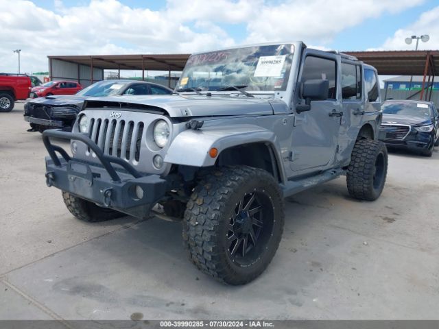 1C4BJWEG2EL157338 Jeep Wrangler Unlimited Sahara