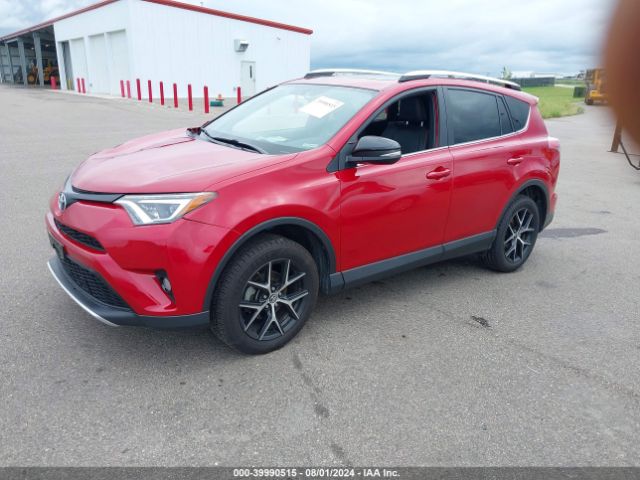 2T3JFREV2GW409280 Toyota RAV4 SE