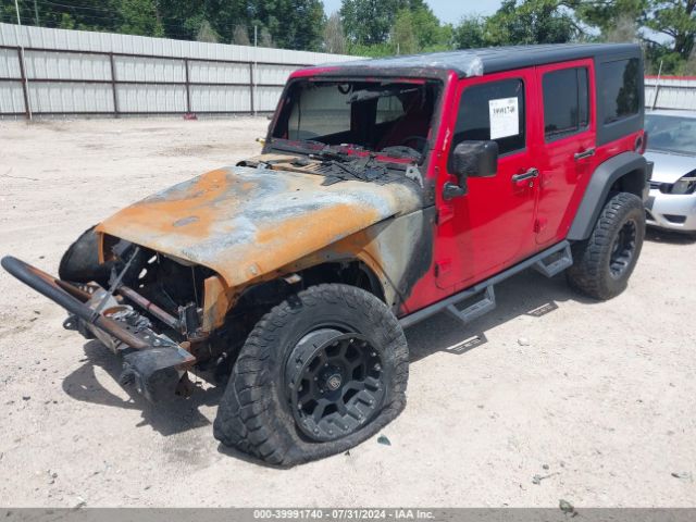 1C4BJWDG8GL143075 Jeep Wrangler Unlimited Sport