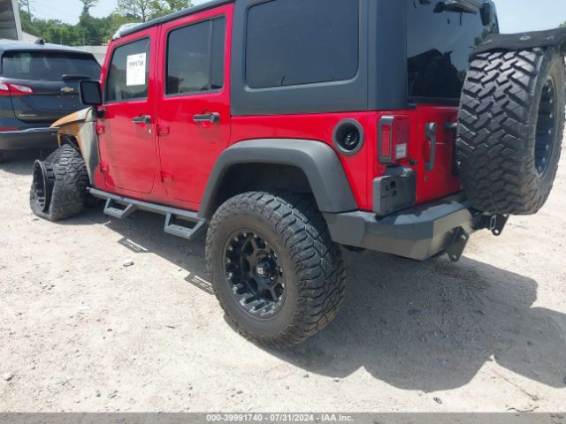 1C4BJWDG8GL143075 Jeep Wrangler Unlimited Sport
