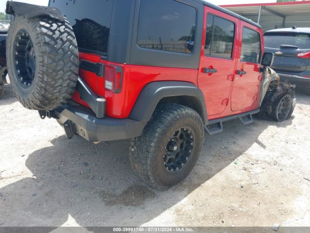 1C4BJWDG8GL143075 Jeep Wrangler Unlimited Sport