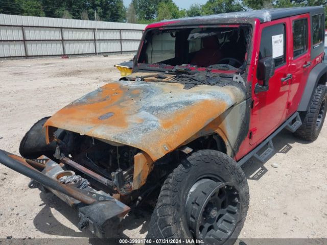 1C4BJWDG8GL143075 Jeep Wrangler Unlimited Sport