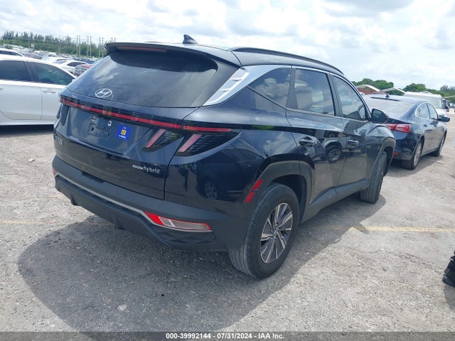 KM8JBCA13NU039278 Hyundai Tucson Hybrid Blue