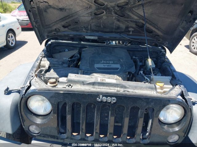 1C4BJWDG3EL194075 Jeep Wrangler Unlimited Sport