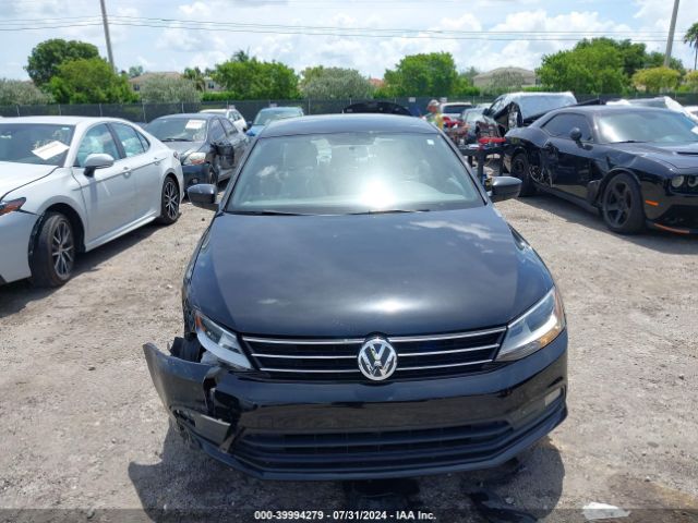 3VWD17AJ0GM384610 Volkswagen Jetta 1.8t Sport