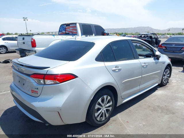 Toyota Corolla Hybrid Le 2021 JTDEAMDE6MJ013609 Image 4