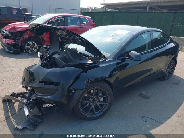 2023 TESLA MODEL 3 5YJ3E1EA0PF678832 Photo 1