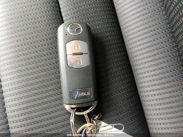 JM1DKBC75G0113582 Mazda Cx-3 Touring