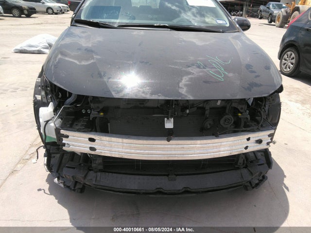 Toyota Corolla Hybrid Le 2024 JTDBCMFE7R3036855 Image 6
