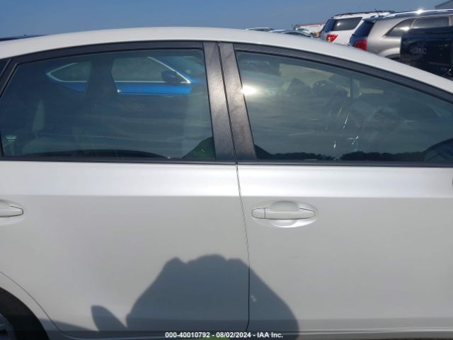 JTDZN3EUXEJ006931 Toyota Prius V Three