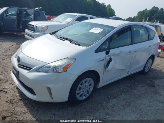 JTDZN3EUXEJ006931 Toyota Prius V Three