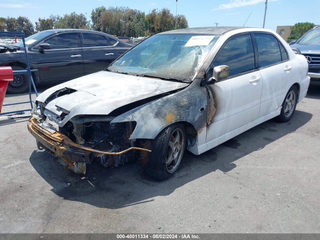2002 MITSUBISHI LANCER JA3AJ86E62U051600 Photo 1