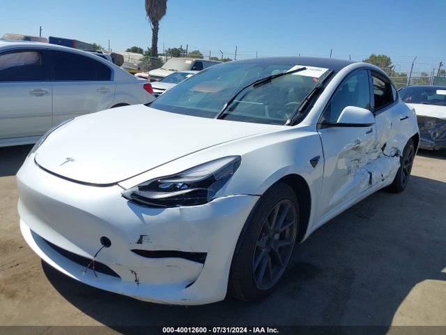 2023 TESLA MODEL 3 5YJ3E1EA0PF516909 Photo 1