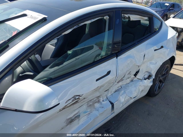 2023 TESLA MODEL 3 5YJ3E1EA0PF516909 Photo 5
