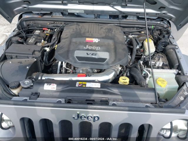 1C4BJWDG7EL100909 Jeep Wrangler Unlimited Sport