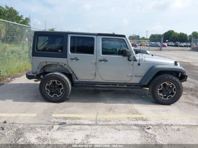 1C4BJWDG7EL100909 Jeep Wrangler Unlimited Sport
