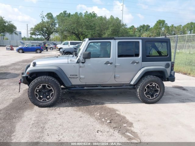 1C4BJWDG7EL100909 Jeep Wrangler Unlimited Sport