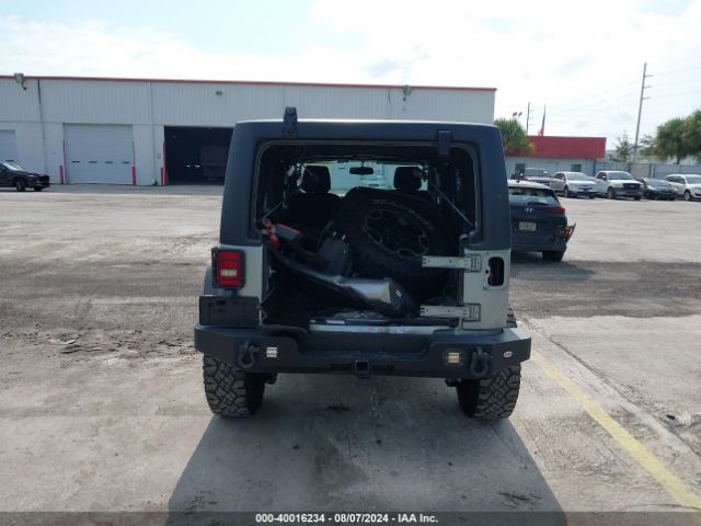 1C4BJWDG7EL100909 Jeep Wrangler Unlimited Sport