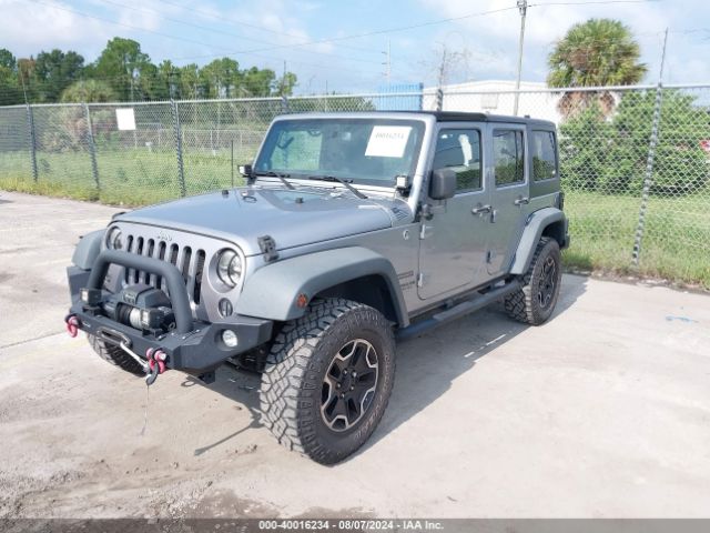 1C4BJWDG7EL100909 Jeep Wrangler Unlimited Sport