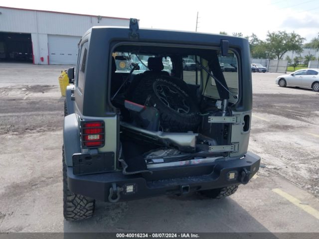 1C4BJWDG7EL100909 Jeep Wrangler Unlimited Sport