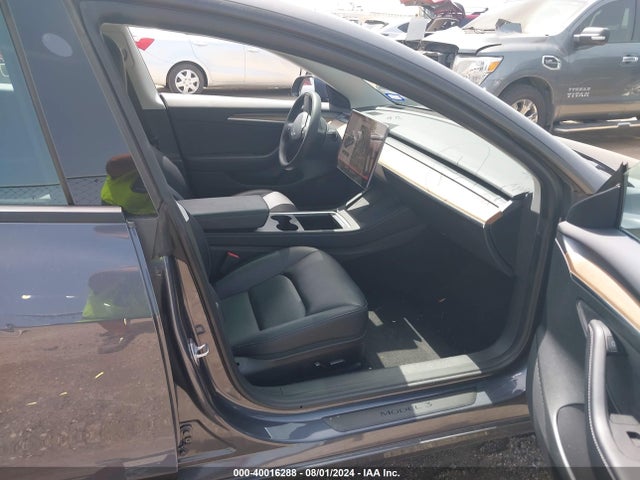 2023 TESLA MODEL 3 5YJ3E1EAXPF423072 Photo 4