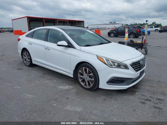 2015 5NPE34AB0FH133633 main image