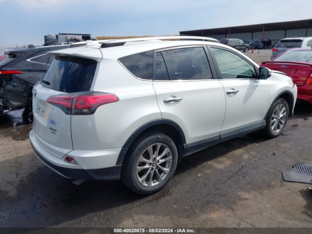 JTMDFREV0GJ085872 Toyota Rav4 Limited