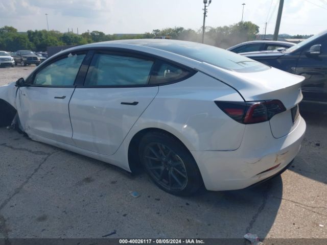2023 TESLA MODEL 3 5YJ3E1EA8PF705551 Photo 2
