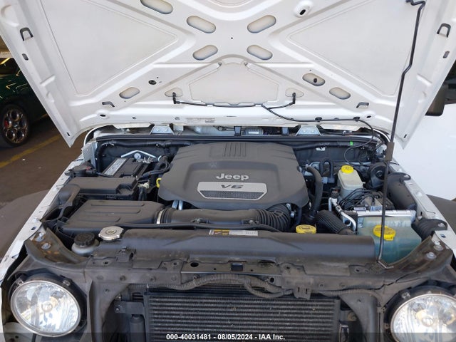 1C4BJWDG4EL250945 Jeep Wrangler Unlimited Sport