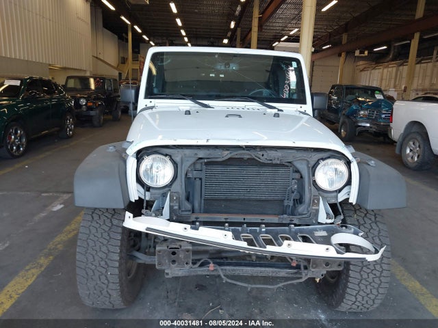 1C4BJWDG4EL250945 Jeep Wrangler Unlimited Sport