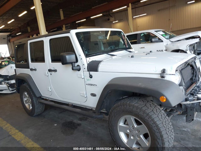 1C4BJWDG4EL250945 Jeep Wrangler Unlimited Sport