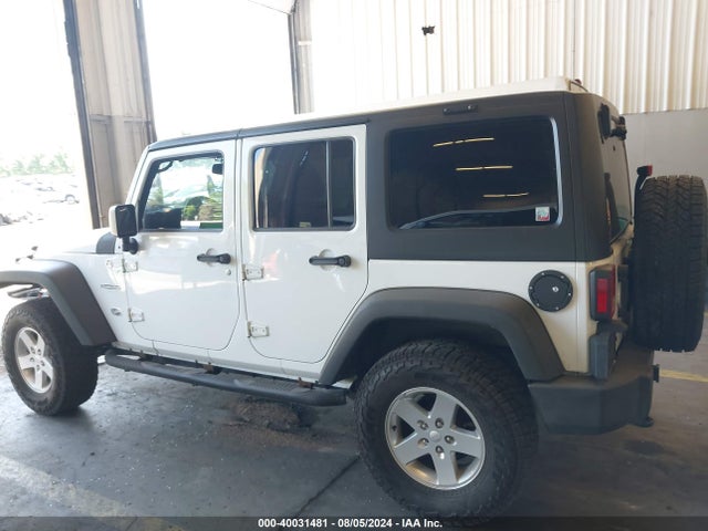 1C4BJWDG4EL250945 Jeep Wrangler Unlimited Sport