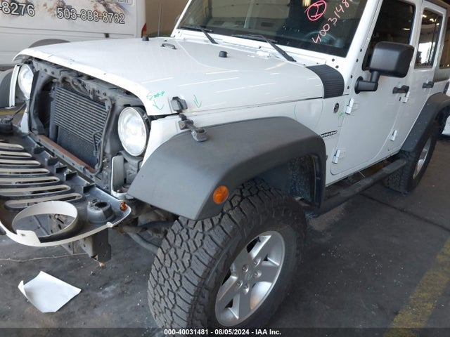 1C4BJWDG4EL250945 Jeep Wrangler Unlimited Sport