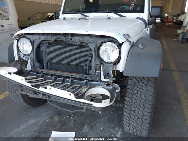 1C4BJWDG4EL250945 Jeep Wrangler Unlimited Sport
