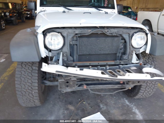 1C4BJWDG4EL250945 Jeep Wrangler Unlimited Sport