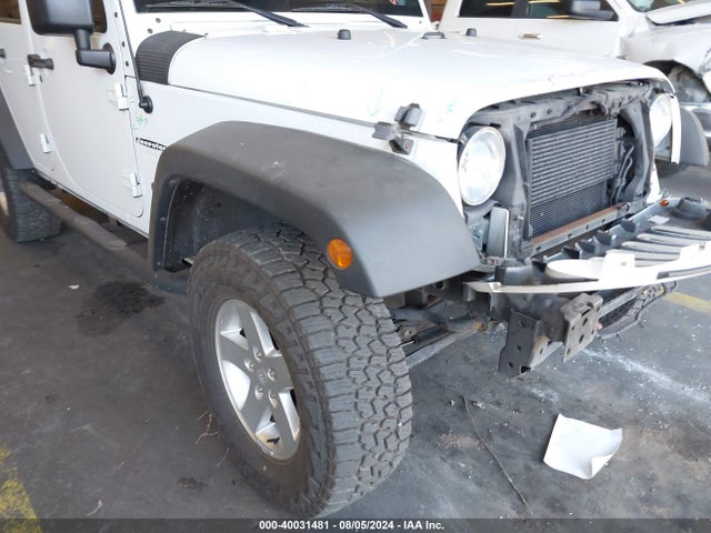 1C4BJWDG4EL250945 Jeep Wrangler Unlimited Sport