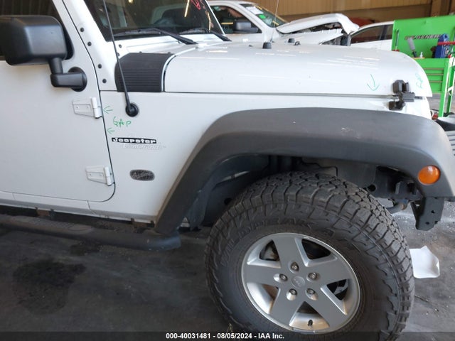 1C4BJWDG4EL250945 Jeep Wrangler Unlimited Sport