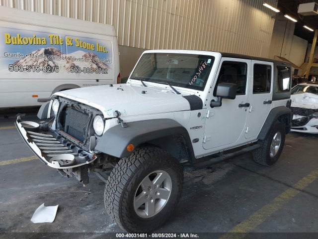 1C4BJWDG4EL250945 Jeep Wrangler Unlimited Sport