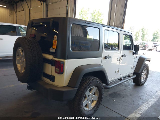 1C4BJWDG4EL250945 Jeep Wrangler Unlimited Sport