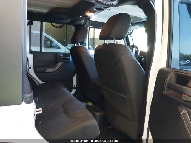1C4BJWDG4EL250945 Jeep Wrangler Unlimited Sport
