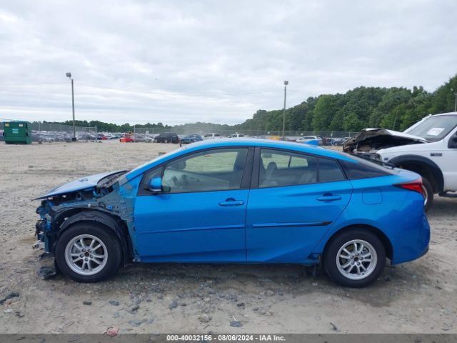 JTDL9RFU6K3003004 Toyota Prius Le