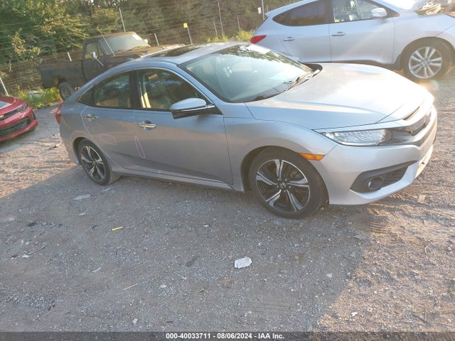 Honda Civic Touring 2016 19XFC1F90GE040979 Image 1