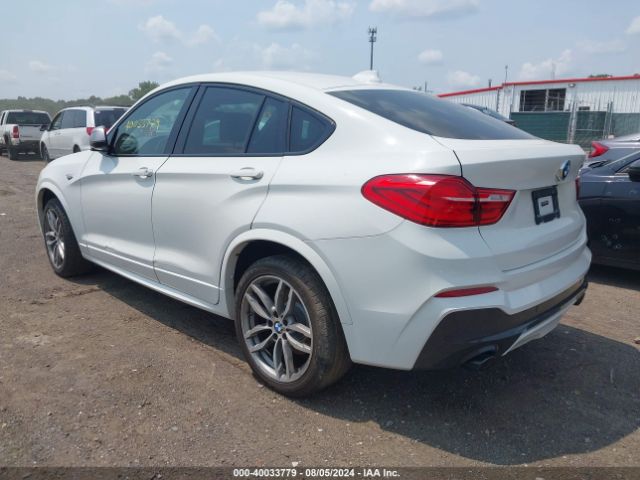 5UXXW7C55J0W64940 BMW X4 M40i