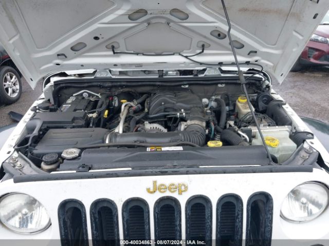 1C4GJWAG4EL249935 Jeep Wrangler Sport