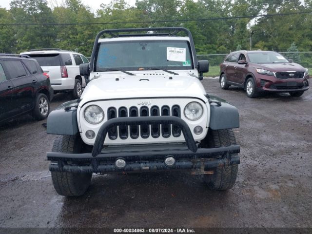 1C4GJWAG4EL249935 Jeep Wrangler Sport