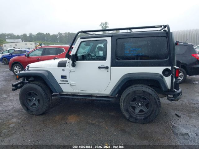 1C4GJWAG4EL249935 Jeep Wrangler Sport