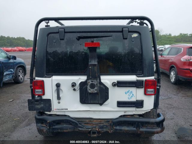 1C4GJWAG4EL249935 Jeep Wrangler Sport